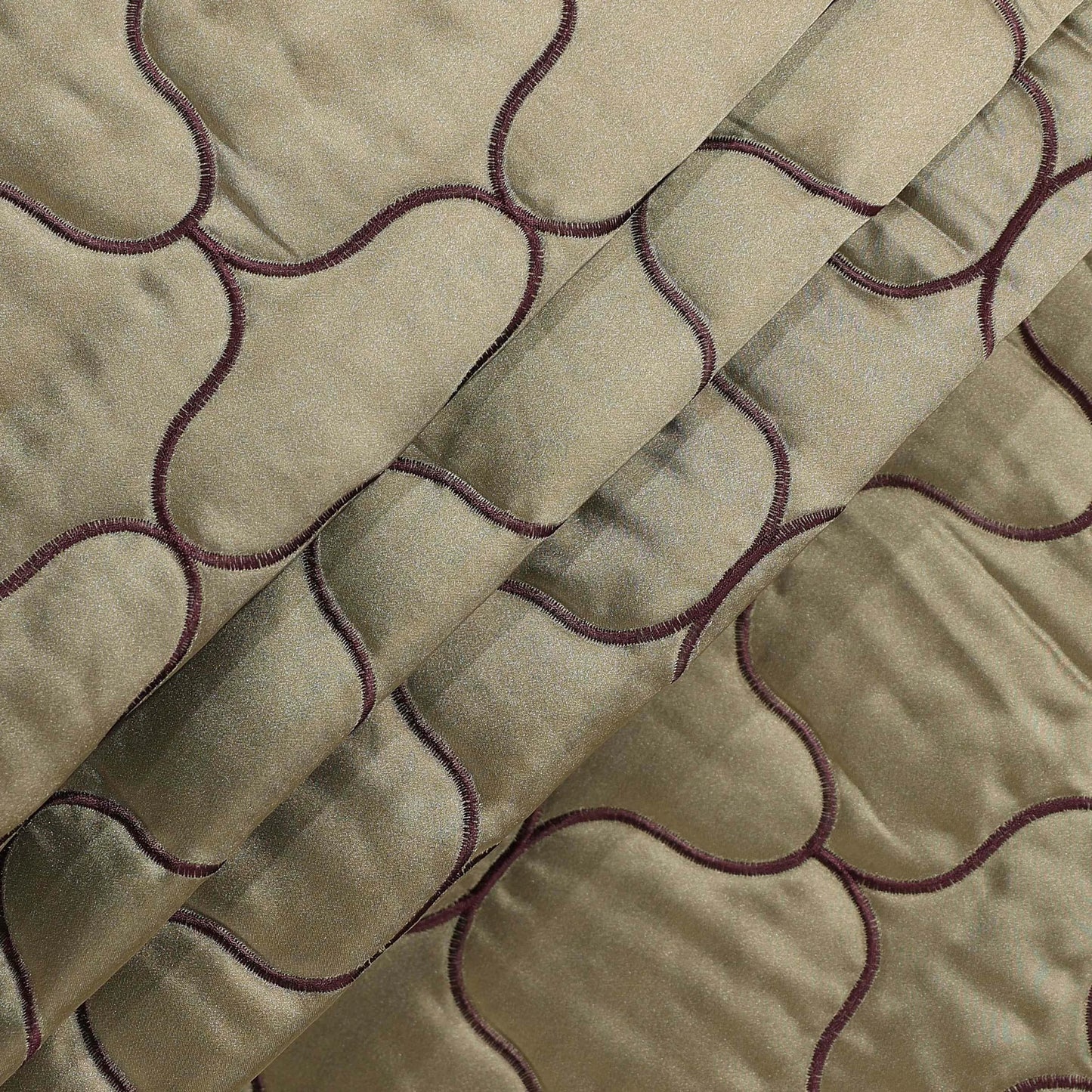 Quilted On Rust Satin Fabric